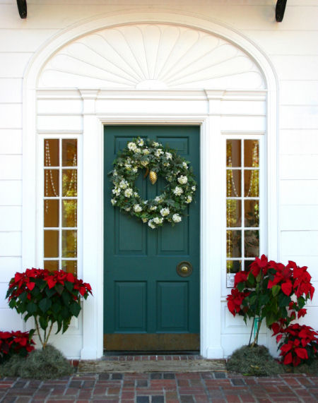 Poinsettias in Christmas doorway
